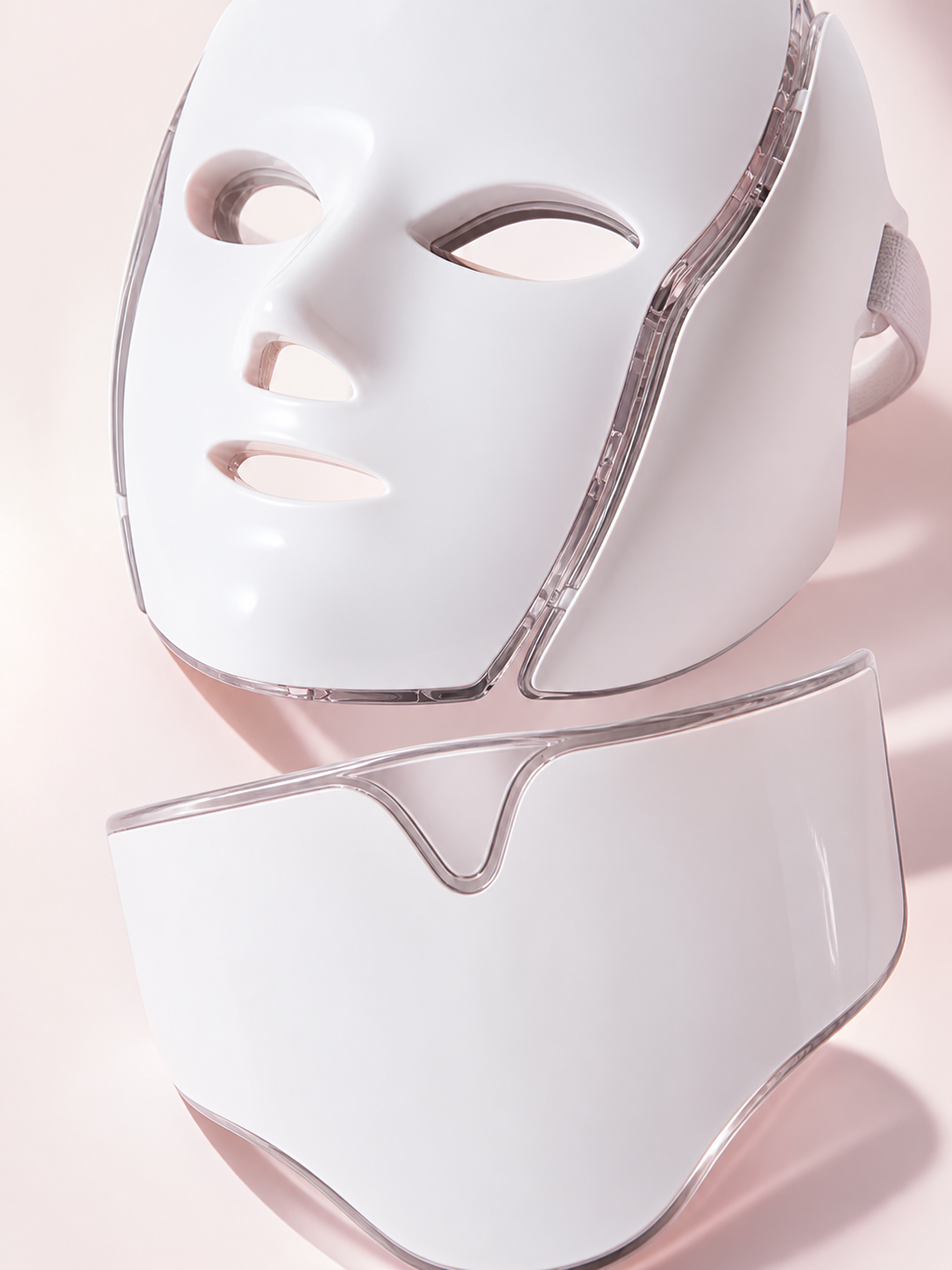 Close view of the coordinated white PhotonMask face mask and chest attachment finish