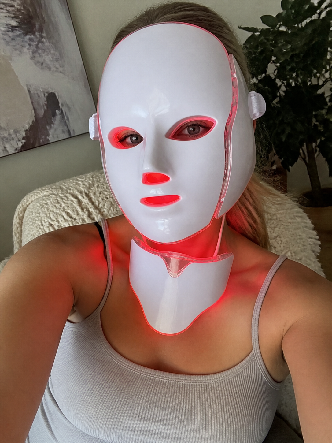Lifestyle selfie scene with the white PhotonMask face and chest set